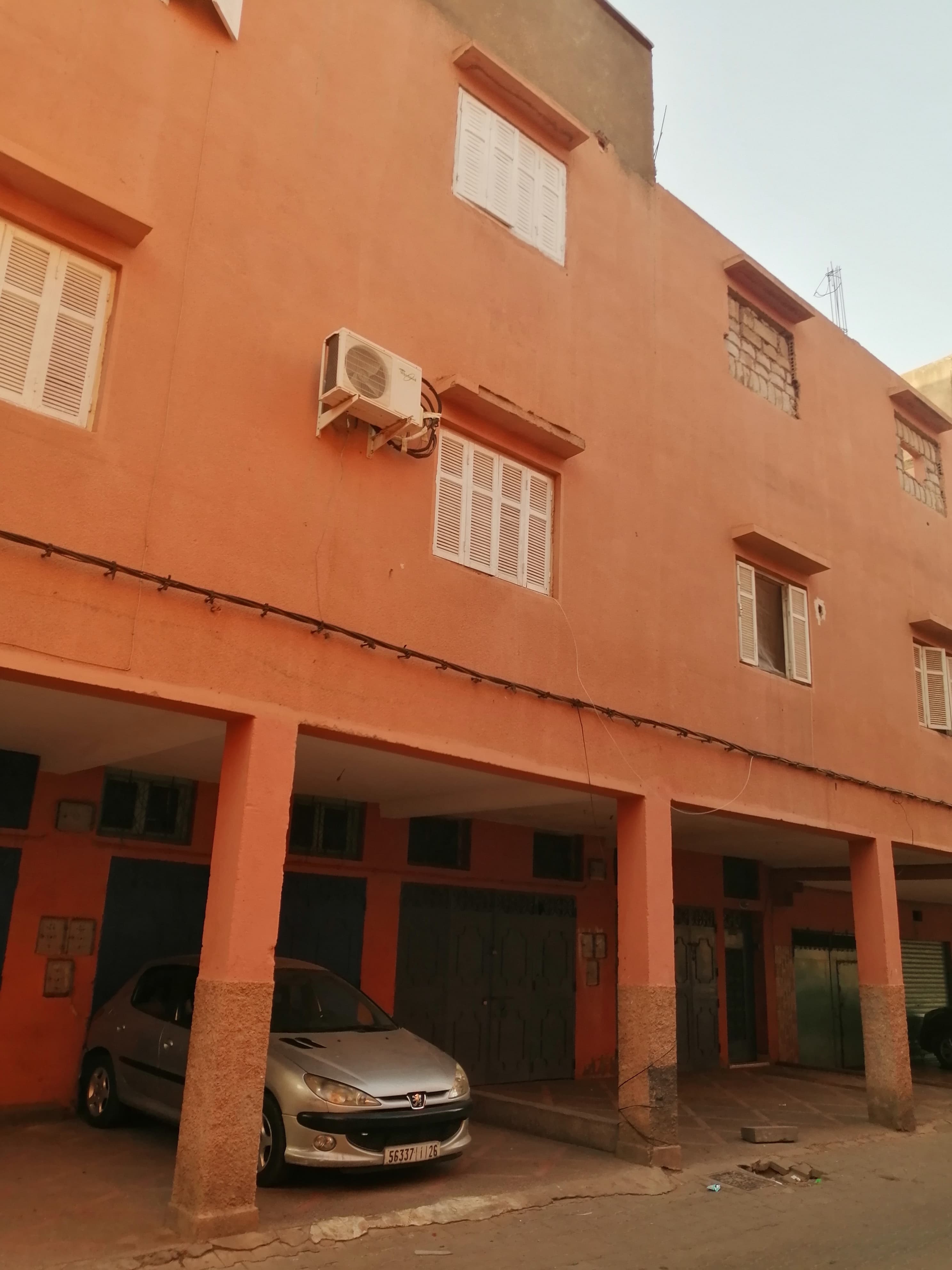 Two-Story House with 4 Commercial Shops for Sale