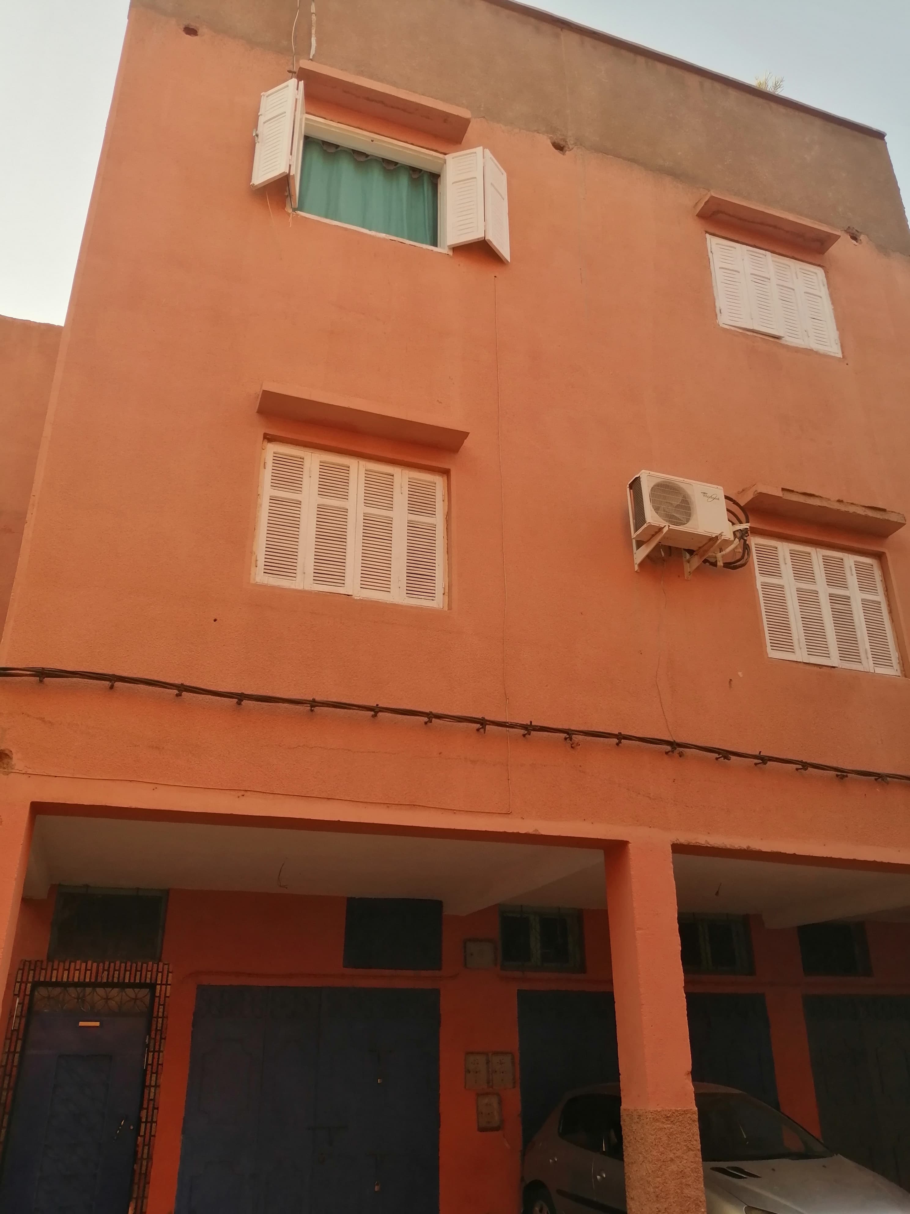 Two-Story House with 4 Commercial Shops for Sale